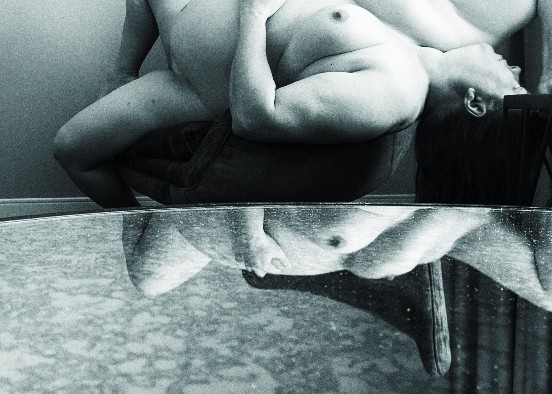 Nude, black and white, reclining, mirrored table